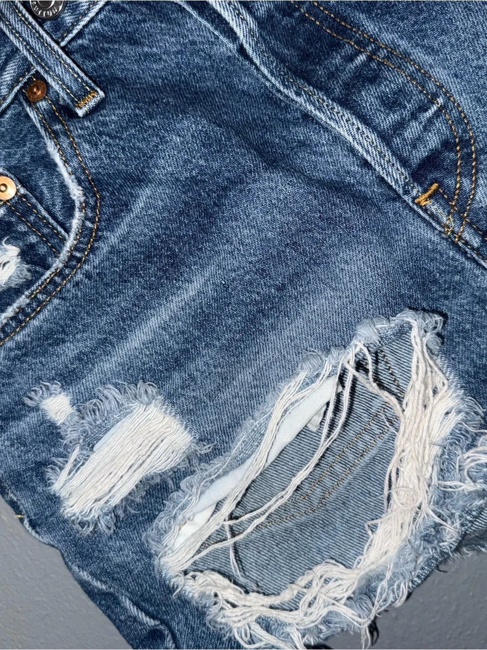 Levi's Light Blue Ripped Denim Cutoff Shorts